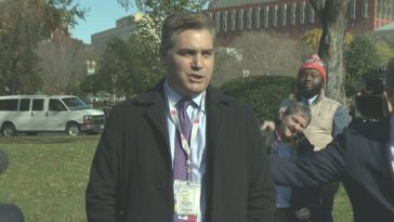 jim acosta press pass